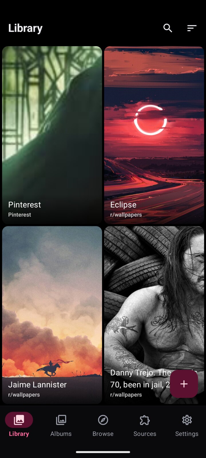 WallBase library displaying saved wallpapers